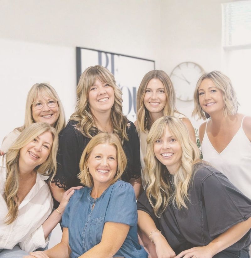 group of smiling hairstylists from salt and moxie co hair salon in downtown paso robles